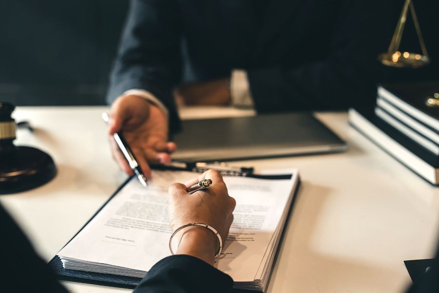 Person signing a contract